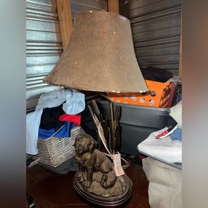 Dog lamp. Needs a new lamp shade. Other than that, in good condition.